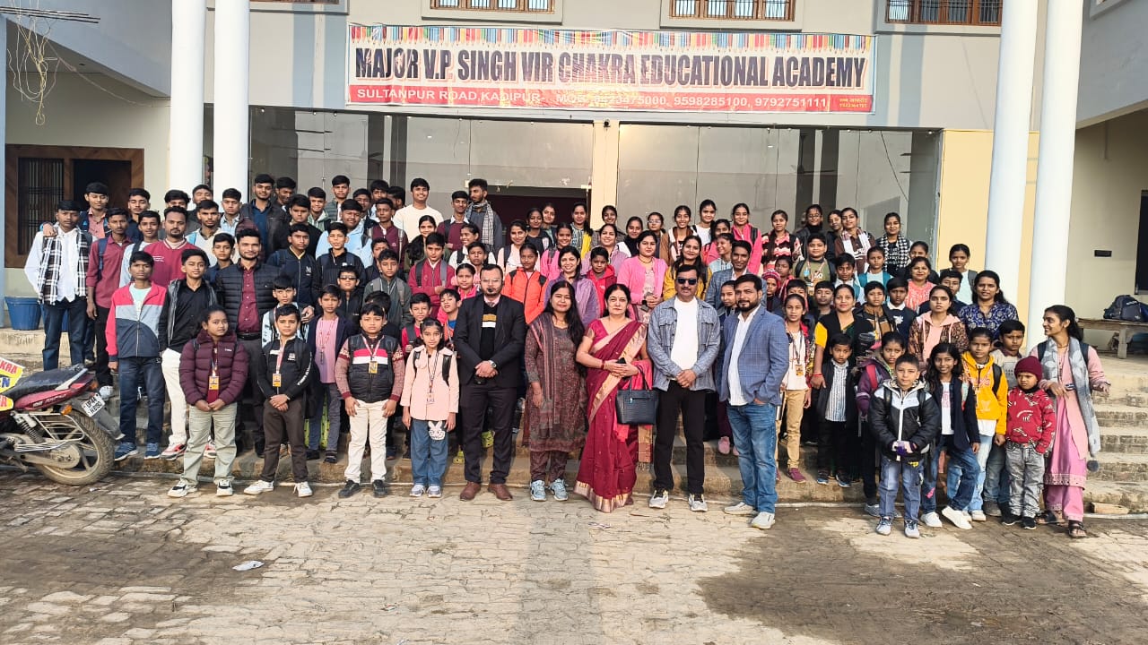Students and teachers in front of the academy building